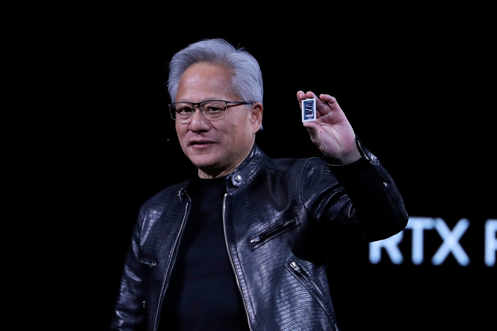 Nvidia CEO Jensen Huang delivers a speech during the Computex 2026 exhibition in Taipei, Taiwan, Monday, June 1, 2026. (AP Photo/Chiang Ying-ying)
