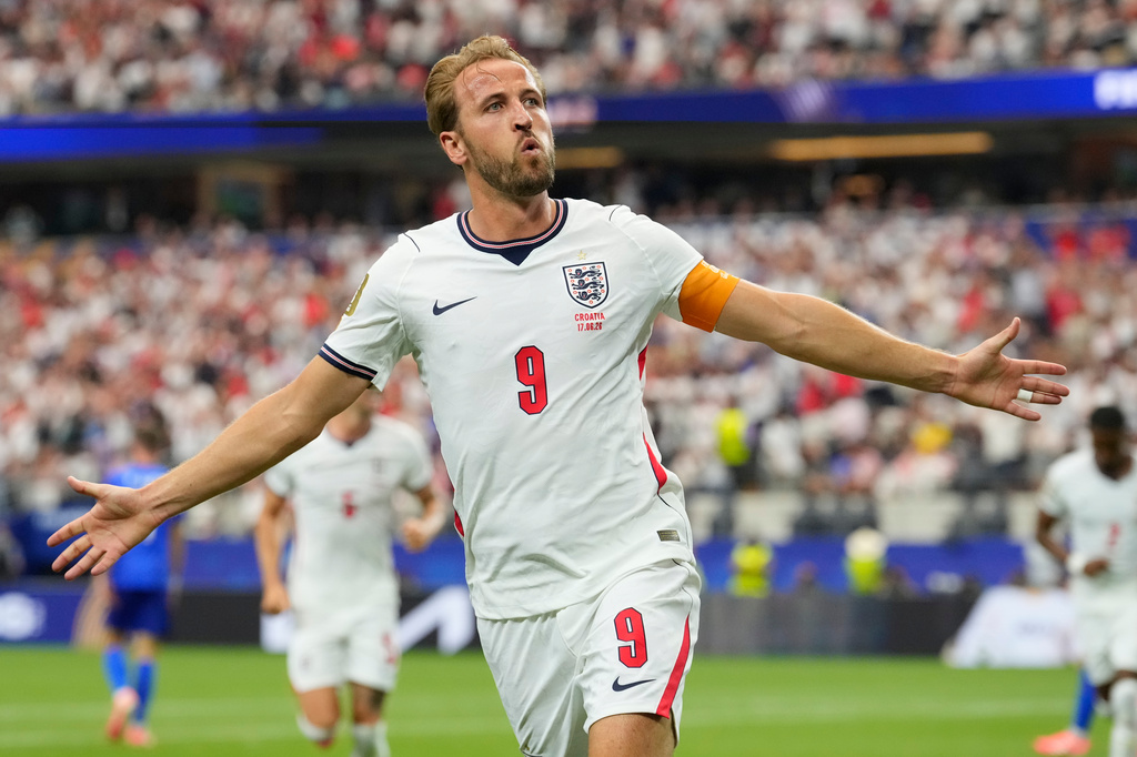 England's Harry Kane (9) celebrates after scoring a goal during the World Cup Group L soccer match between England and Croatia in Arlington, Texas, near Dallas, Wednesday, June 17, 2026. (AP Photo/Tony Gutierrez)