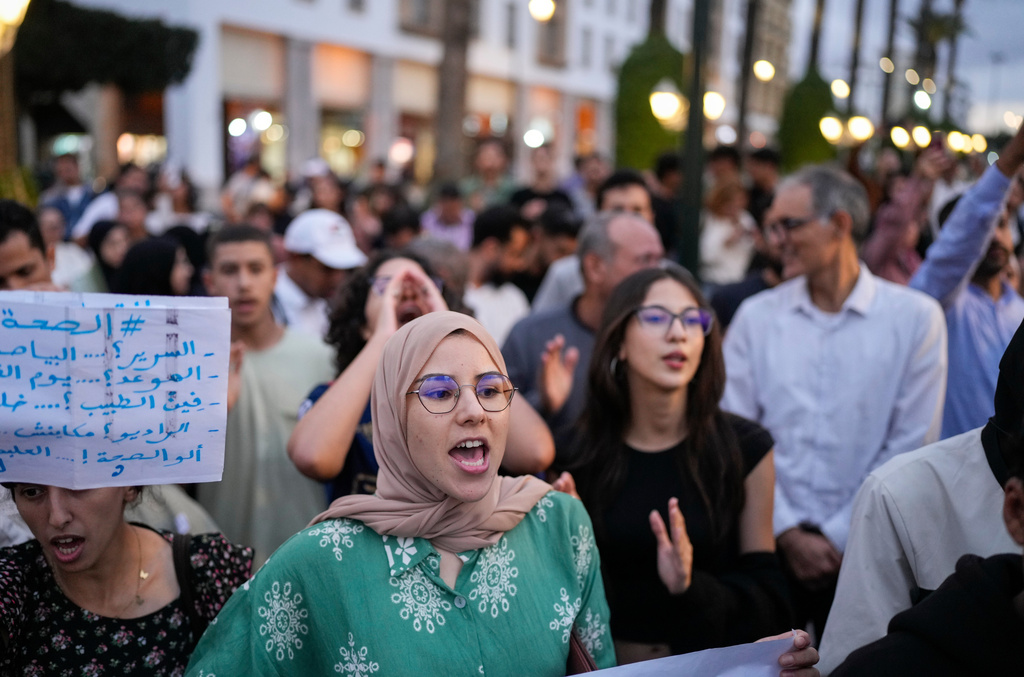 People take part in a youth-led protest against corruption and calling for education and healthcare reforms, in Rabat, Morocco, Thursday, Oct. 9, 2025. (AP Photo/Mosa'ab Elshamy)