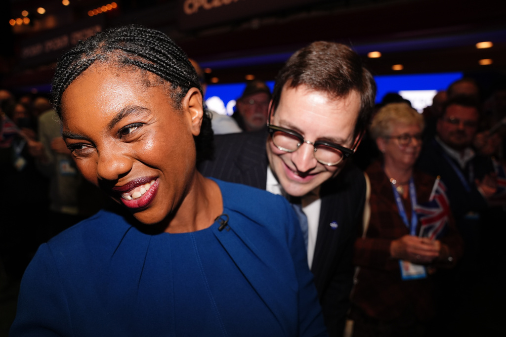 Conservative Party leader Kemi Badenoch with her husband, Hamish Badenoch, leave the stage after delivering her keynote speech during the Conservative Party conference at the International Convention Centre, Birmingham, England, Wednesday, Oct. 7, 2026. (Jacob King/Pool Photo via AP)