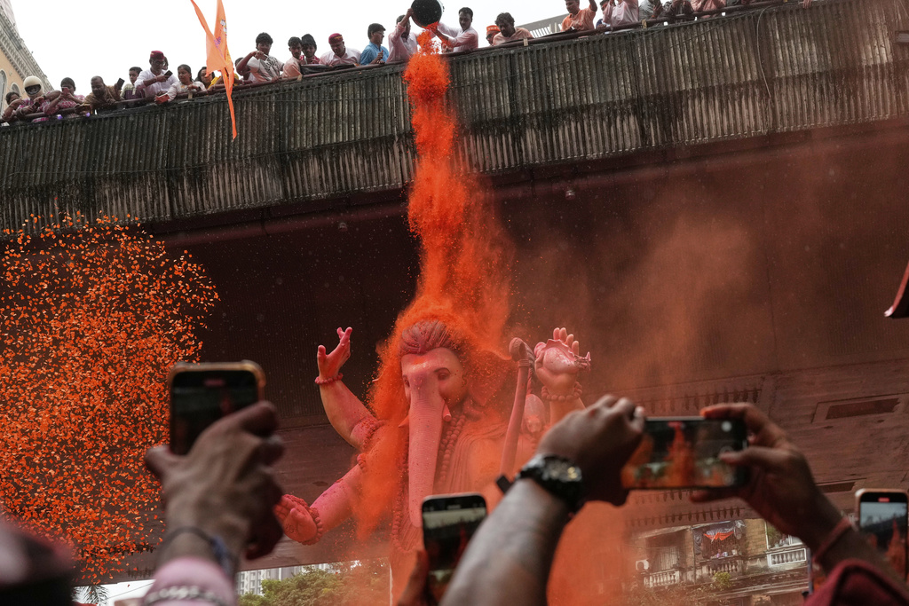 An idol of elephant-headed Hindu god Ganesha is taken for immersion on the final day of the ten-day long Ganesh Chaturthi festival in Mumbai, India, Saturday, Sept. 6, 2025. (AP Photo/Rajanish Kakade)