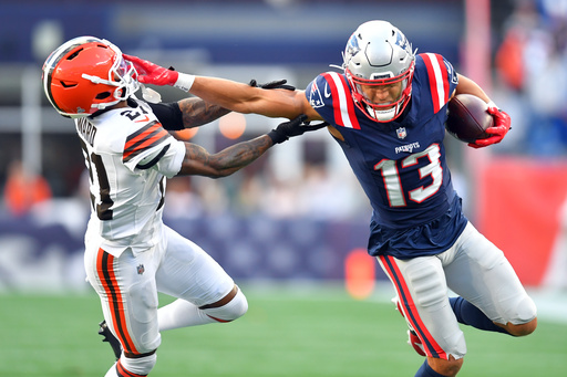 New England Patriots wide receiver Mack Hollins (13) gets pas Cleveland Browns cornerback Denzel Ward (21) in the second half of an NFL football game on Sunday, Oct. 26, 2025, in Foxborough, Mass. (AP Photo/Steven Senne) New England Patriots wide receiver Mack Hollins (13) gets pas Cleveland Browns cornerback Denzel Ward (21) in the second half of an NFL football game on Sunday, Oct. 26, 2025, in Foxborough, Mass. (AP Photo/Steven Senne)