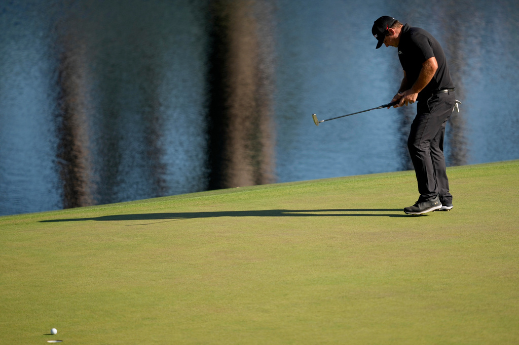 Patrick Reed reacts after missing a putt on the 15th hole during the second round of the Masters golf tournament at the Augusta National Golf Club, Friday, April 10, 2026, in Augusta, Ga. (AP Photo/Ashley Landis)
