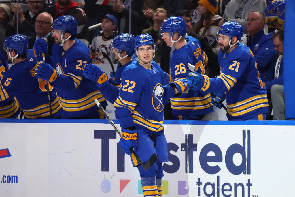 Buffalo Sabres right wing Jack Quinn (22) celebrates his goal during the second period of an NHL hockey game against the Carolina Hurricanes Sunday, Nov. 23, 2025, in Buffalo, N.Y. (AP Photo/Jeffrey T. Barnes)