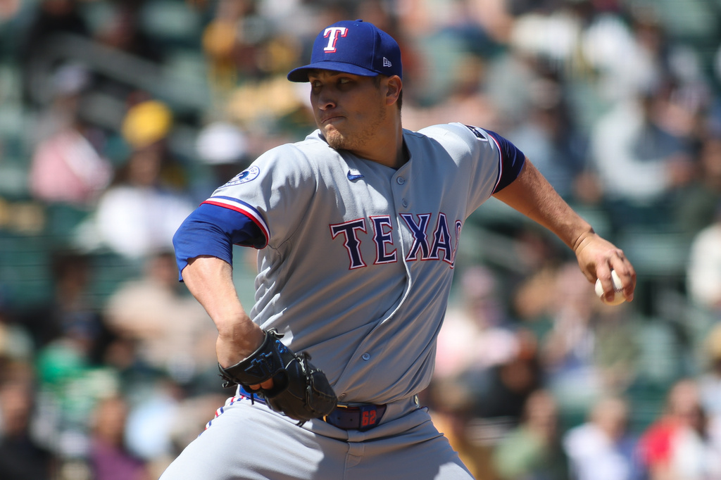 Texas Rangers pitcher Robert Garcia throws to an Athletics batter during the sixth inning of a baseball game Thursday, April 16, 2026, in West Sacramento, Calif. (AP Photo/Scott Marshall)