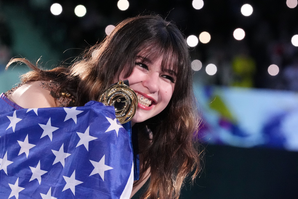 Alysa Liu, of the United States, poses after winning the gold medal in the women's event at the ISU Grand Prix of Figure Skating Final in Nagoya, central Japan, Saturday, Dec. 6, 2025. (AP Photo/Hiro Komae)