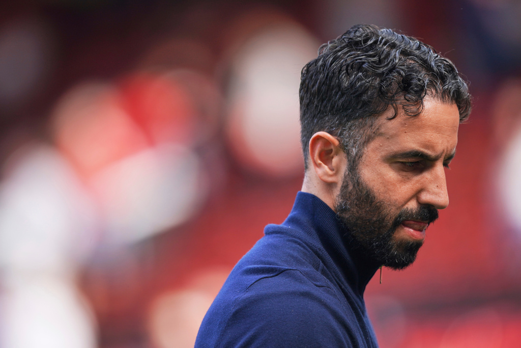 FILE - Manchester United's head coach Ruben Amorim walks on the pitch at the end of the English Premier League soccer match between Manchester United and West Ham at Old Trafford stadium in Manchester, England, Sunday, May 11, 2025. (AP Photo/Ian Hodgson, file)