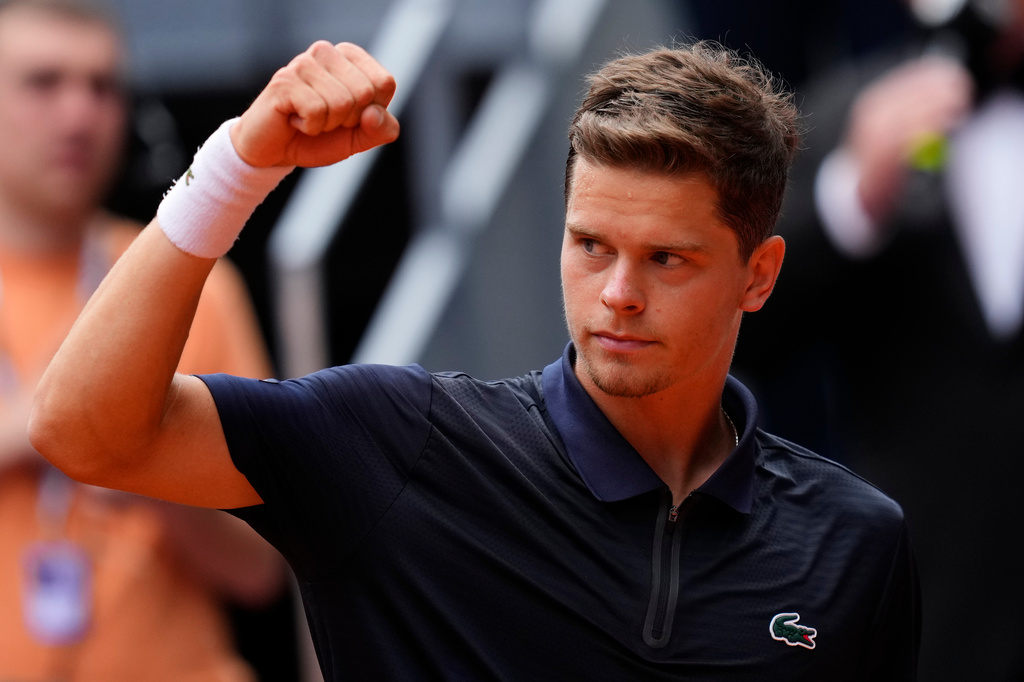Alexander Blockx of Belgium celebrates after winning the quarterfinal match against Casper Ruud of Norway during at the Madrid Open tennis tournament in Madrid, Thursday, April 30, 2026. (AP Photo/Jose Breton)