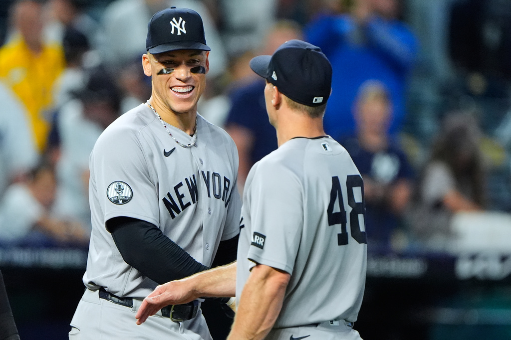 New York Yankees' Aaron Judge and Paul Goldschmidt (48) celebrate after their baseball game against the Kansas City Royals, Tuesday, May 26, 2026, in Kansas City, Mo. (AP Photo/Charlie Riedel)