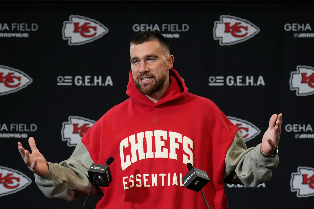 Kansas City Chiefs tight end Travis Kelce talks to reporters following an NFL football game against the Denver Broncos Thursday, Dec. 25, 2025, in Kansas City. (AP Photo/Charlie Riedel)