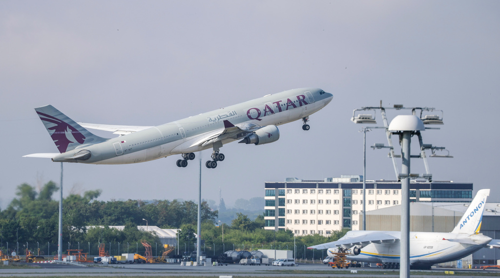 FILE -A Qatar Airways plane takes off from Leipzig/Halle Airport, July 18, 2025, Saxony, Schkeuditz. (Jan Woitas/dpa/dpa via AP, File)