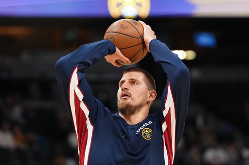 Denver Nuggets center Nikola Jokić warms up before a preseason NBA basketball game against the Chicago Bulls, Tuesday, Oct. 14, 2025, in Denver. (AP Photo/Jack Dempsey) Denver Nuggets center Nikola Jokić warms up before a preseason NBA basketball game against the Chicago Bulls, Tuesday, Oct. 14, 2025, in Denver. (AP Photo/Jack Dempsey)