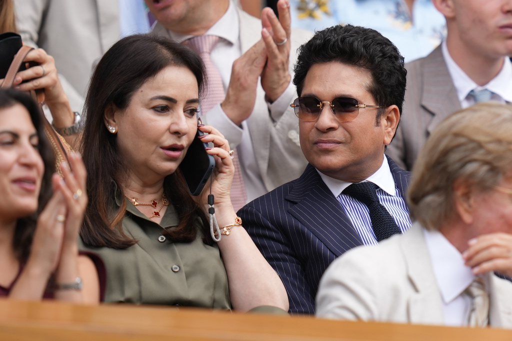 Former Indian cricket player Sachin Tendulkar sits in the Royal Box as he watches the men's singles semifinal matches on Center Court at the Wimbledon Tennis Championships in London, Friday, July 10, 2026. (AP Photo/Kirsty Wigglesworth)