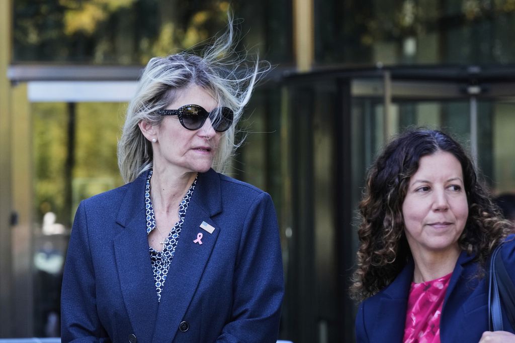 Nadine Menendez, wife of former U.S. Sen. Bob Menendez, left, and her lawyer Sarah Krissoff leave a Manhattan federal court in New York, Thursday, Sept. 11, 2025. (AP Photo/Richard Drew)