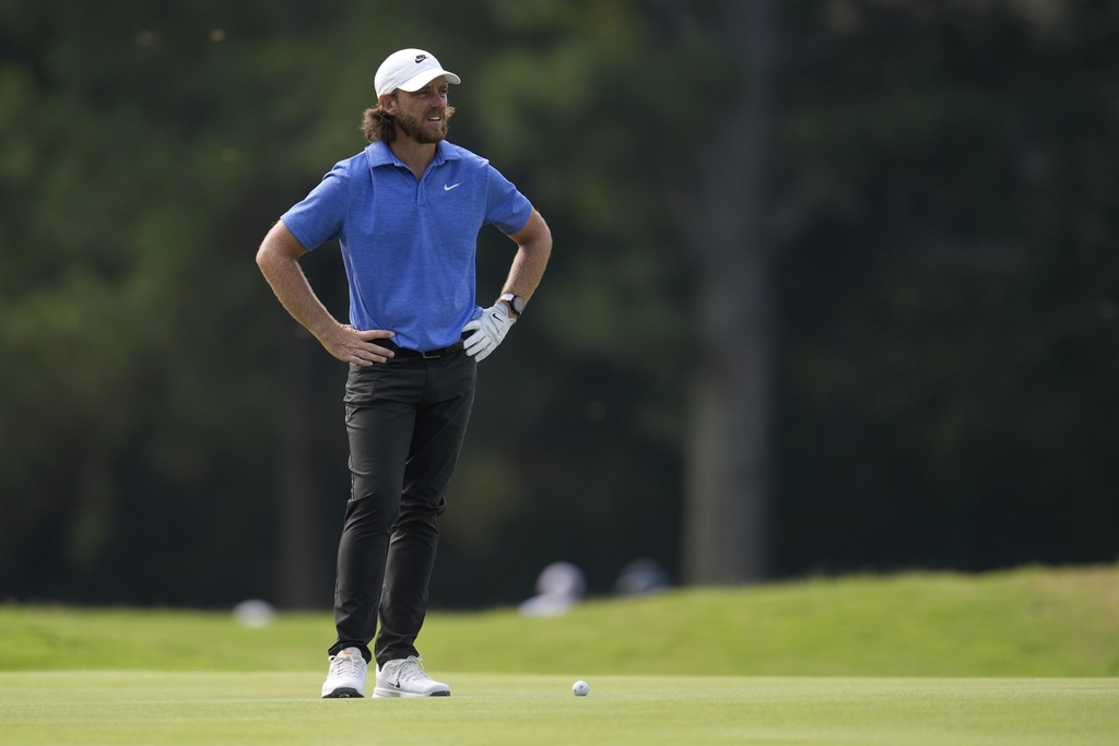Tommy Fleetwood, of England, looks at his shot from the second fairway during the second round of the St. Jude Championship golf tournament Friday, Aug. 8, 2025, in Memphis, Tenn. (AP Photo/George Walker IV)