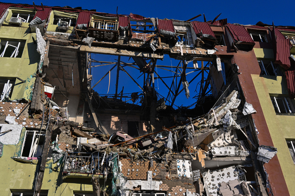 A residential building is seen heavily damaged after a Russian strike in Odesa, Ukraine, Monday, April 6, 2026. (AP Photo/Michael Shtekel)