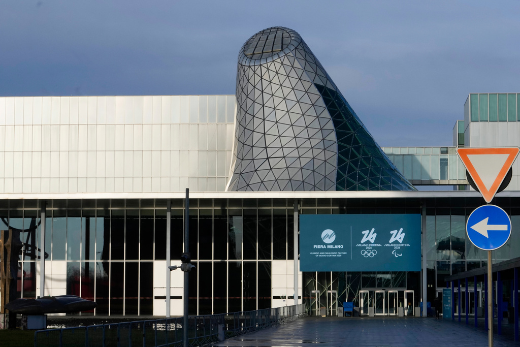 FILE - A view of the main entrance of the Rho Fair, which will be called Milano Ice Park, venue for the ice hockey and speed skating disciplines at the Milan Cortina 2026 Winter Olympics, in Rho, near Milan, Italy, Tuesday, Jan. 28, 2025. (AP Photo/Luca Bruno, File)