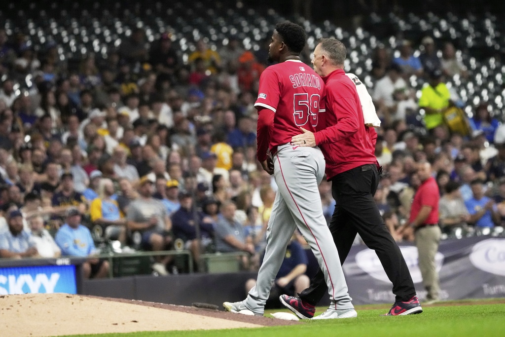Los Angeles Angels pitcher José Soriano leaves the game with an injury during the second inning of a baseball game against the Milwaukee Brewers Wednesday, Sept. 17, 2025, in Milwaukee. (AP Photo/Morry Gash)