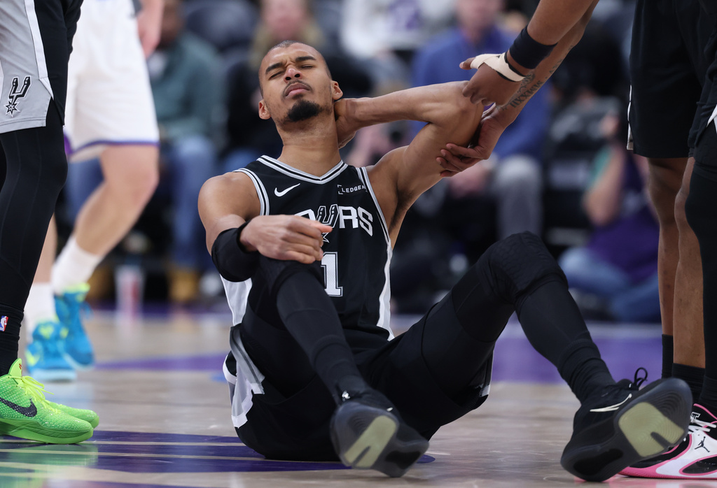 San Antonio Spurs forward Victor Wembanyama reacts after a play against the Utah Jazz during the second half of an NBA basketball game, Thursday, Jan. 22, 2026, in Salt Lake City. (AP Photo/Rob Gray)
