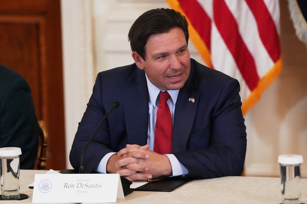 FILE - Florida Gov. Ron DeSantis is seen before a roundtable discussion on college sports in the East Room of the White House, Friday, March 6, 2026, in Washington. (AP Photo/Julia Demaree Nikhinson, File)
