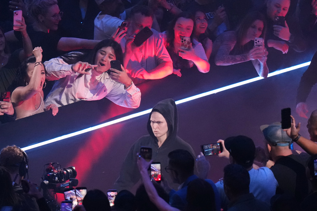Ronda Rousey, of the United States, is introduced before facing Gina Carano, of the United States, in a featherweight mixed martial arts fight Saturday, May 16, 2026, in Inglewood, Calif. (AP Photo/Jae C. Hong )