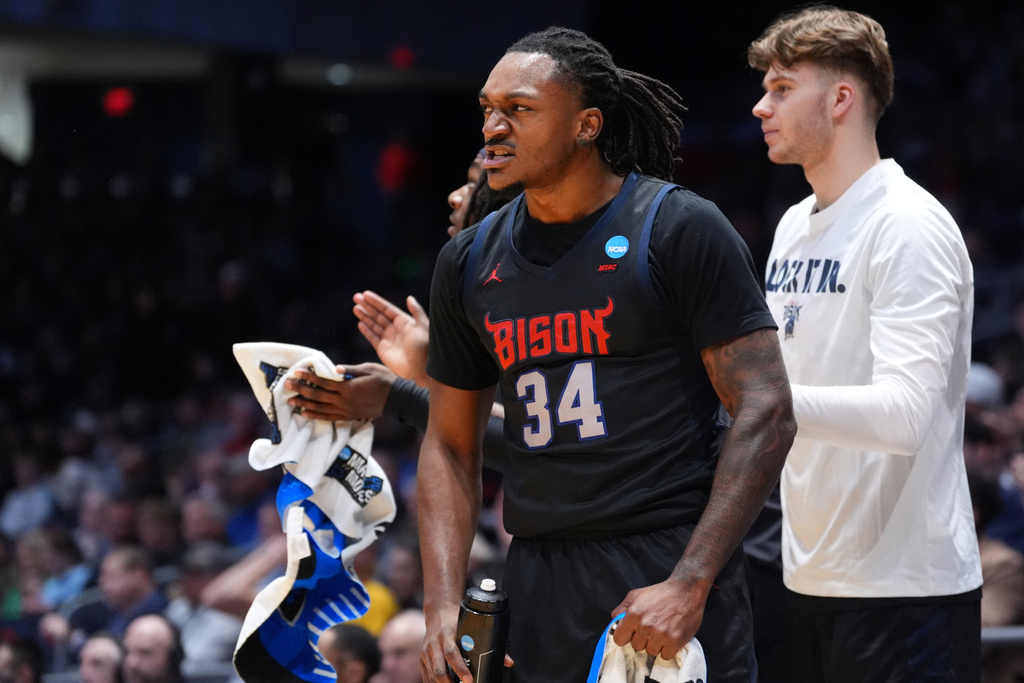 Howard guard Bryce Harris (34) reacts off the bench following a made basket during the first half in a First Four college basketball game in the NCAA Tournament against UMBC, Tuesday, March 17, 2026, in Dayton, Ohio. (AP Photo/Kareem Elgazzar)