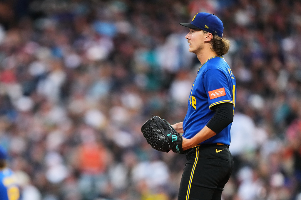 Seattle Mariners starting pitcher Bryce Miller reacts to a two-run home run by San Francisco Giants' Bryce Eldridge during the fifth inning of a baseball game, Friday, July 17, 2026, in Seattle. (AP Photo/Lindsey Wasson)