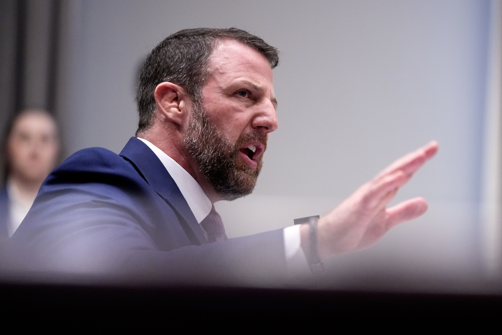 Sen. Markwayne Mullin, R-Okla., President Donald Trump's pick for Homeland Security secretary, testifies during Senate Committee on Homeland Security and Governmental Affairs hearing, Wednesday, March 18, 2026 on Capitol Hill in Washington. (AP Photo/Manuel Balce Ceneta)