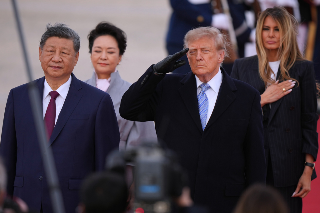 President Donald Trump and first lady Melania Trump greet Chinese President Xi Jinping and his wife Peng Liyuan as they arrive at Joint Base Andrews, Md., Wednesday, Sept. 23, 2026. (AP Photo/Mark Schiefelbein)