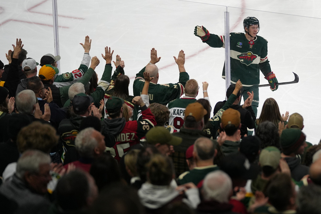 Minnesota Wild left wing Matt Boldy celebrates after scoring a goal during the second period of an NHL hockey game against the Utah Mammoth, Tuesday, March 10, 2026, in St. Paul, Minn. (AP Photo/Abbie Parr)