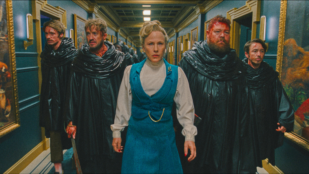 This image released by Warner Bros. Pictures shows, from left, David Viviers, Tom Felton, Patricia Arquette, Willie Ludik, and Gabe Gabriel in a scene from "They Will Kill You." (Warner Bros. Pictures via AP)