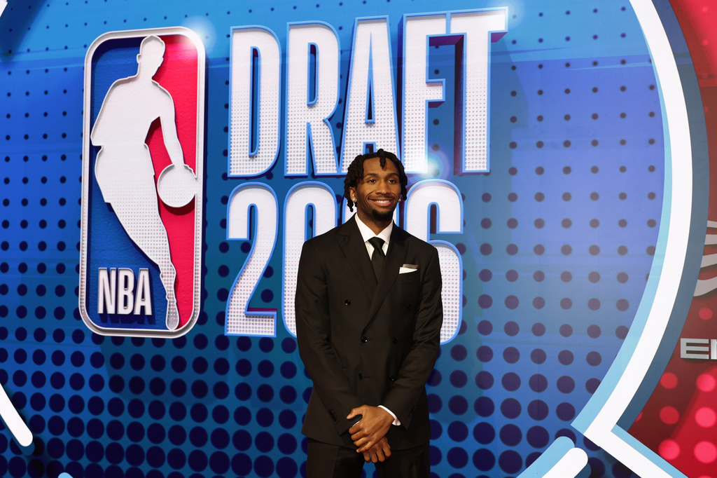 Darryn Peterson arrives for the first round of the NBA basketball draft Tuesday, June 23, 2026, in New York. (AP Photo/Adam Hunger)