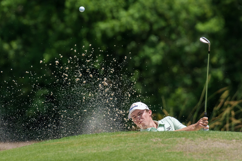 Matt Fitzpatrick, of England, hits from a bunker on the second hole during the final round of the PGA Zurich Classic of New Orleans golf tournament, Sunday, April 26, 2026, in Avondale, La. (AP Photo/Matthew Hinton)
