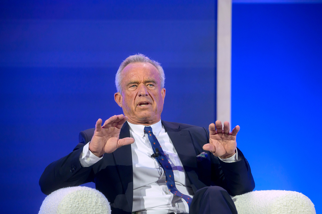 Health and Human Services Secretary Robert F. Kennedy, Jr., speaks at the inaugural Make America Healthy Again Summit at the Waldorf Astoria Hotel, Wednesday, Nov. 12, 2025, in Washington. (AP Photo/Rod Lamkey, Jr.)