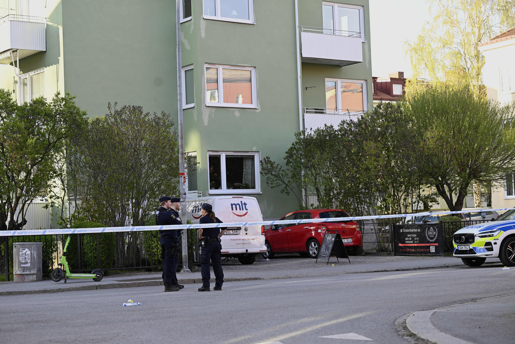 Police at the scene after a shooting incident, at Vaksala Square, in central Uppsala, Sweden, Tuesday, April 29, 2025. (Fredrik Sandberg/TT News Agency via AP)