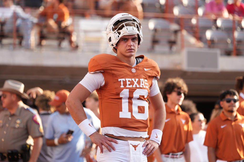 Texas quarterback Arch Manning (16) warms up before an NCAA college football game against Ohio State in Austin, Texas, Saturday, Sept. 12, 2026. (AP Photo/Eric Gay)