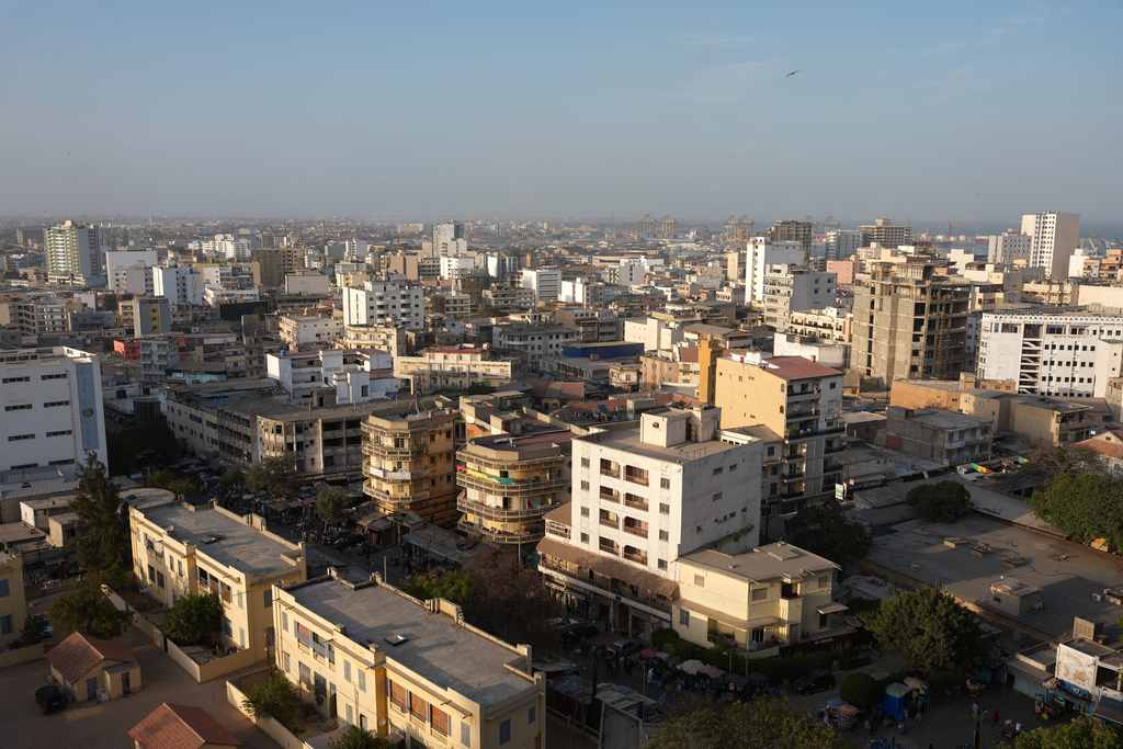 A general view of downtown in Dakar, Senegal, Wednesday, March 18, 2026. (AP Photo/Misper Apawu)