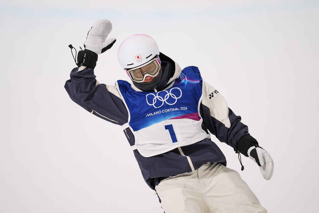 Japan's Yuto Totsuka reacts during the men's snowboarding halfpipe qualifications at the 2026 Winter Olympics, in Livigno, Italy, Wednesday, Feb. 11, 2026. (AP Photo/Abbie Parr)