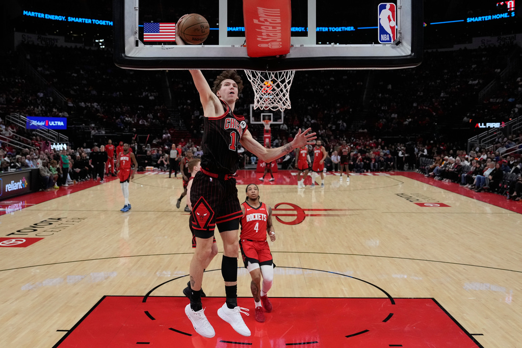 Chicago Bulls forward Matas Buzelis dunks during the first half of an NBA basketball game against the Houston Rockets in Houston, Tuesday, Jan. 13, 2026. (AP Photo/Ashley Landis)