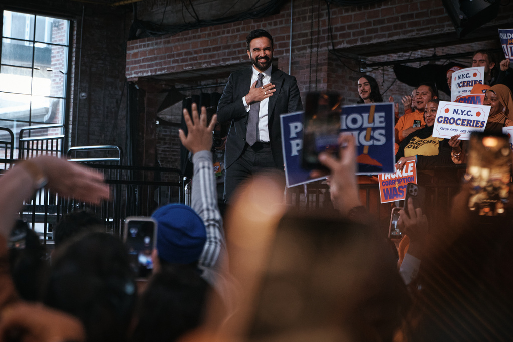 New York City Mayor Zohran Mamdani reacts to his supporters during an address marking his first 100 days in office at the Knockdown Center, Sunday, April 12, 2026, in New York. (AP Photo/Andres Kudacki)