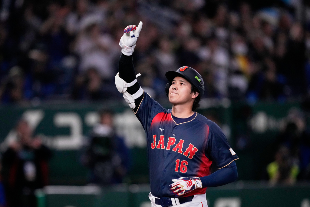 Japan's Shohei Ohtani celebrates after a home run during the second inning of a World Baseball Classic Pool C game between Japan and Taiwan Friday, March 6, 2026 in Tokyo. (AP Photo/Louise Delmotte)
