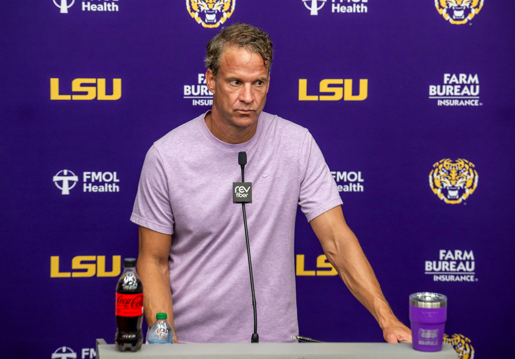 LSU head coach Lane Kiffin fields questions after an NCAA college football practice Monday, Aug. 10, 2026, in Baton Rouge, La. (Michael Johnson/The Advocate via AP)