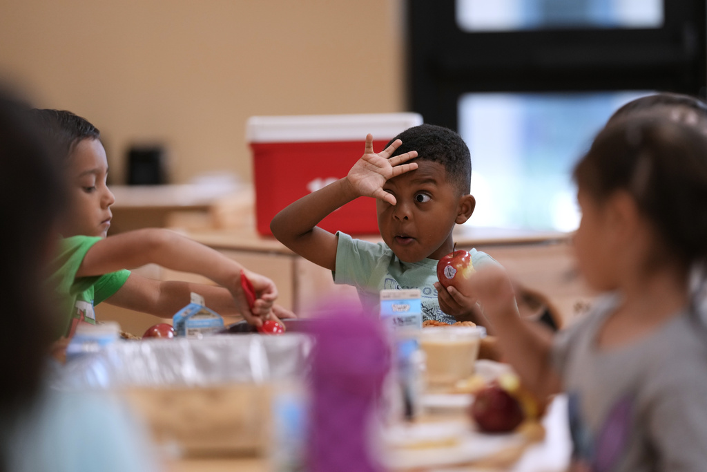 Pre-K 4 SA students eat a provided breakfast, Oct. 9, 2025, in San Antonio. (AP Photo/Eric Gay)