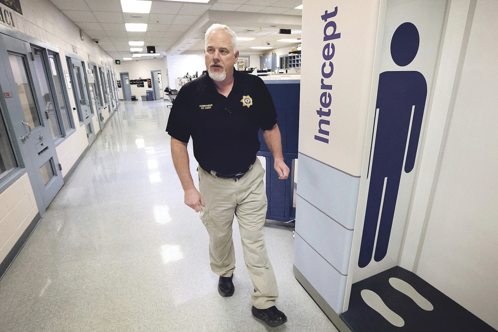 Edward Aber, former commander of the La Plata County, Colo., jail, walks through the facility in Durango, Colo., Dec. 13, 2022. (Jerry McBride/Durango Herald via AP, File)