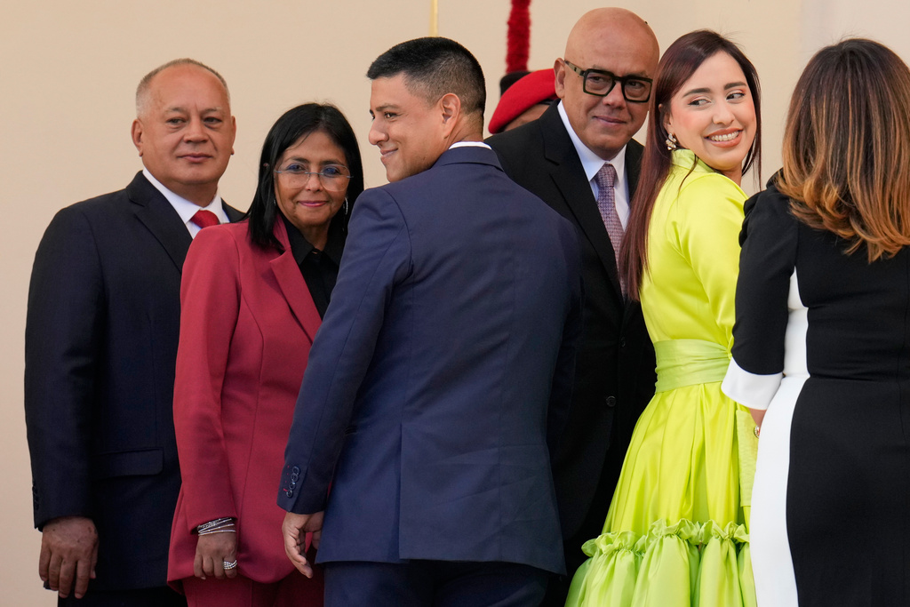 FILE - Venezuelan Interior Minister Diosdado Cabello, from left, Vice President Delcy Rodriguez, National Assembly Vice President Pedro Infante, National Assembly President Jorge Rodriguez and National Assembly Second Vice President America Perez, arrive for the swearing-in ceremony of President Nicolas Maduro for his third term in Caracas, Venezuela, Jan. 10, 2025. (AP Photo/Ariana Cubillos, File)