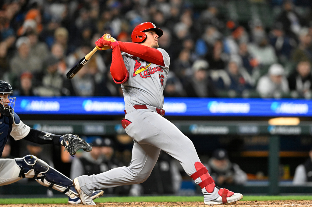 St. Louis Cardinals' Nolan Gorman watches after hitting a sacrifice fly in the eighth inning of a baseball game against the Detroit Tigers, Sunday, April 5, 2026, in Detroit. (AP Photo/Jose Juarez)