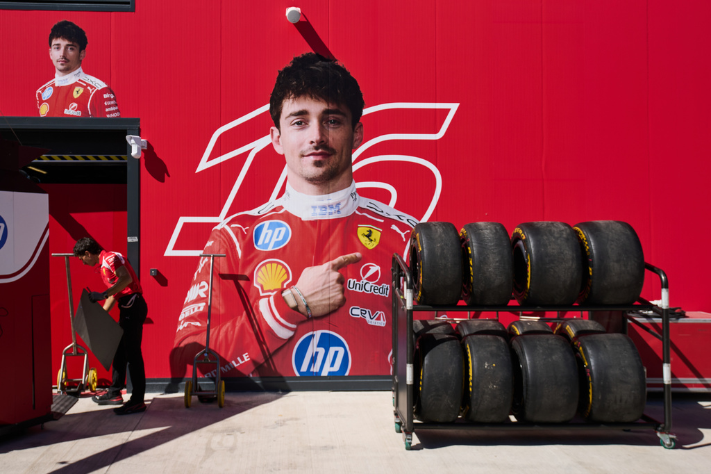 A Ferrari team member works in Charles Leclerc's section of the paddock ahead of the Spanish Formula One Grand Prix in Madrid, Spain, Thursday, Sept. 10, 2026. (AP Photo/Bernat Armangue)