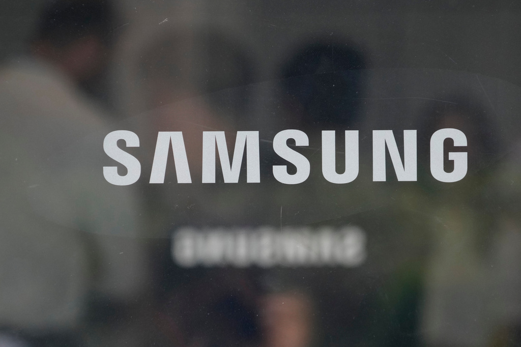 The logo of the Samsung Electronics Co. is seen at its office in Seoul, South Korea, Thursday, July 30, 2026. (AP Photo/Ahn Young-joon)