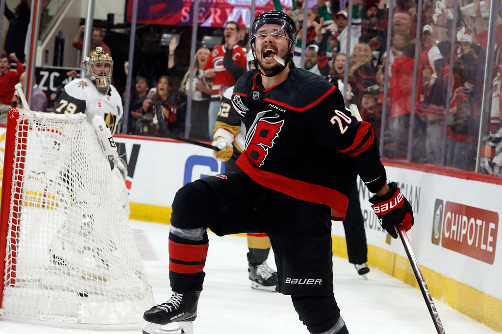 Carolina Hurricanes' Sebastian Aho (20) celebrates after his goal during the second period in Game 5 of the NHL hockey Stanley Cup Final series against the Vegas Golden Knights in Raleigh, N.C., Thursday, June 11, 2026. (AP Photo/Karl DeBlaker)