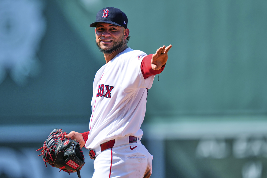 Boston Red Sox's Willson Contreras smiles as he waves to a fan during the seventh inning of a baseball game against the Washington Nationals, Wednesday, July 1, 2026, in Boston. (AP Photo/Charles Krupa)